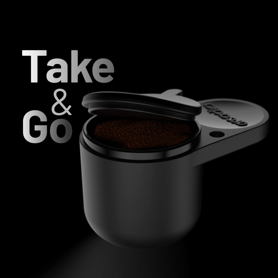Arcadia Go portable rechargeable electric Turkish coffee maker in black, compact design with a handle and brewing spout.