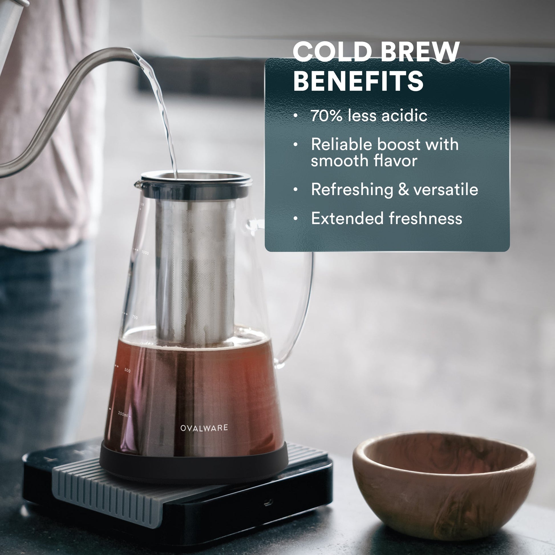 Ovalware Cold Brew Maker with glass brewing jar and black lid, designed for easy cold brew coffee preparation at home.