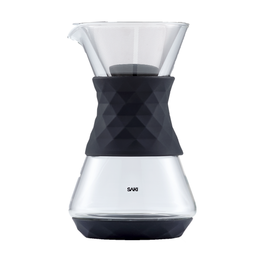 Clear glass pour-over coffee maker from SAKI with a cone-shaped dripper and handle, perfect for fresh brewed coffee.