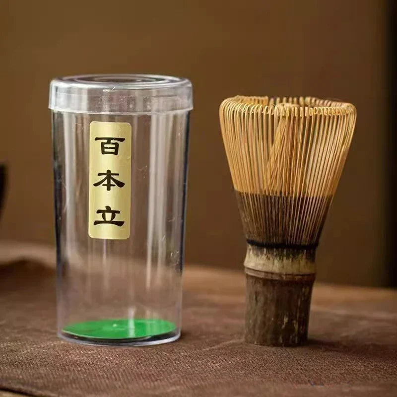Perfecsy Japanese bamboo matcha whisk with pronged tines, used for preparing green tea and matcha in traditional tea ceremonies.