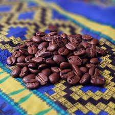 Peru Code 3 Rescue Coffee and Tea roasted coffee beans in a burlap sack, highlighting a rustic, natural coffee presentation.