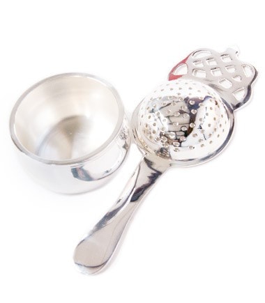Silver plated tea strainer with long handle from Harney & Sons Fine Teas, designed for easy, precise tea brewing.