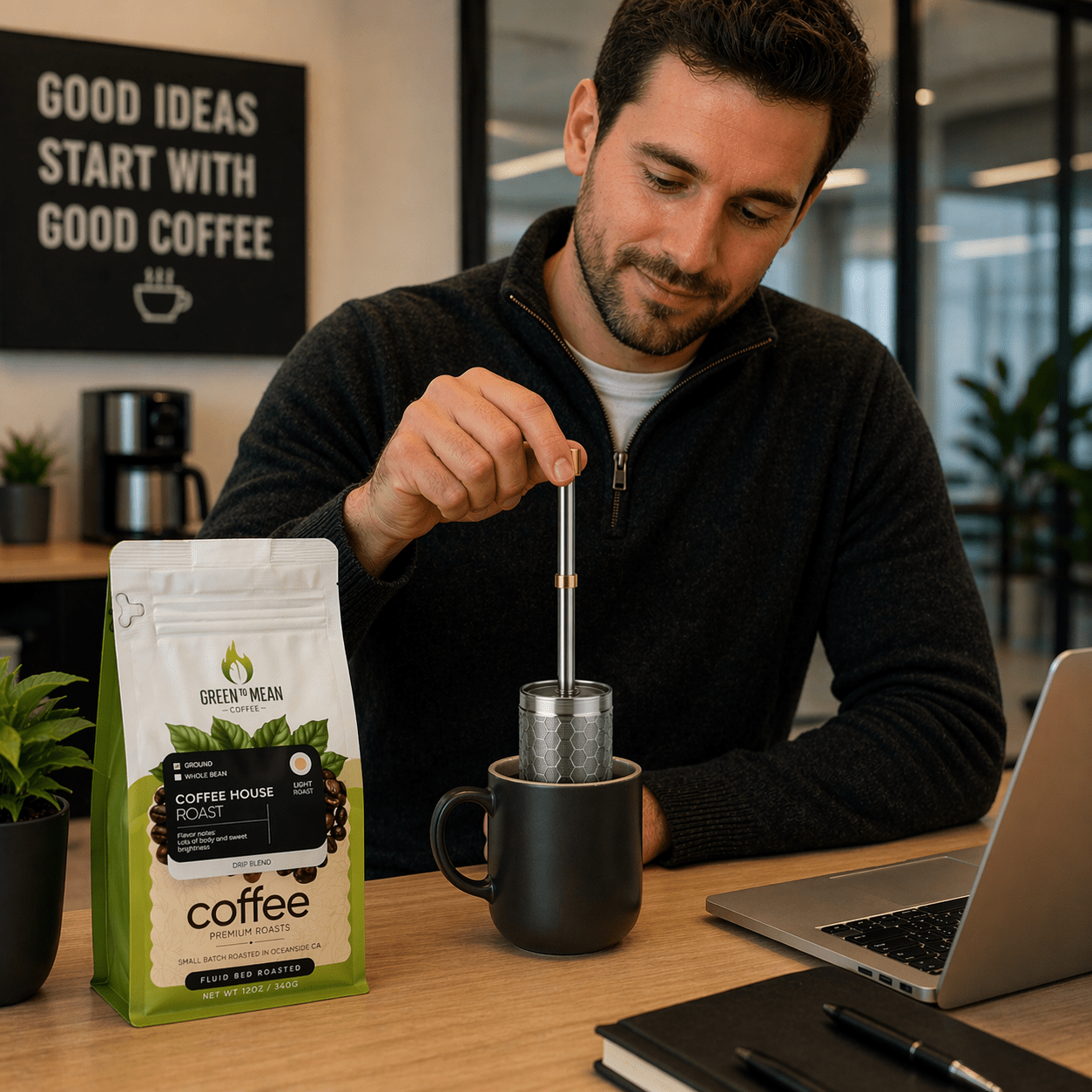 Green to Mean Coffee portable immersion coffee maker with compact design and stainless steel brewing chamber.