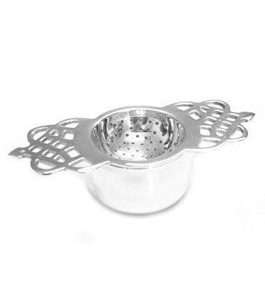 Silver plated tea strainer with short handle from Harney & Sons Fine Teas, designed for brewing loose leaf tea.